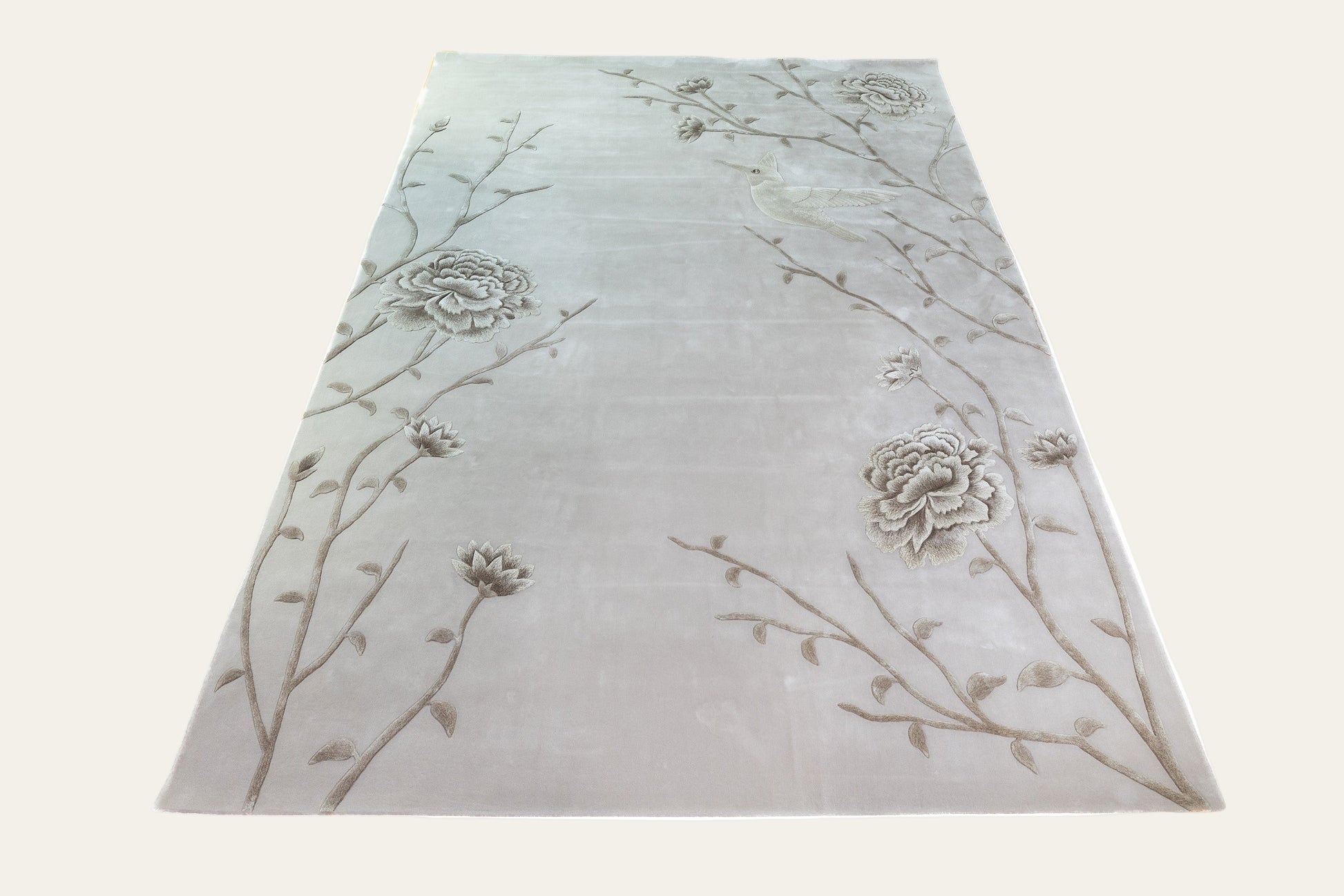 Floral patterned rug on a white background