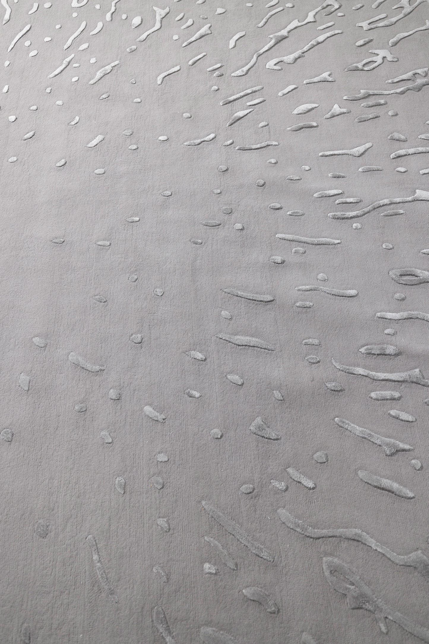 Textured gray surface with subtle patterns