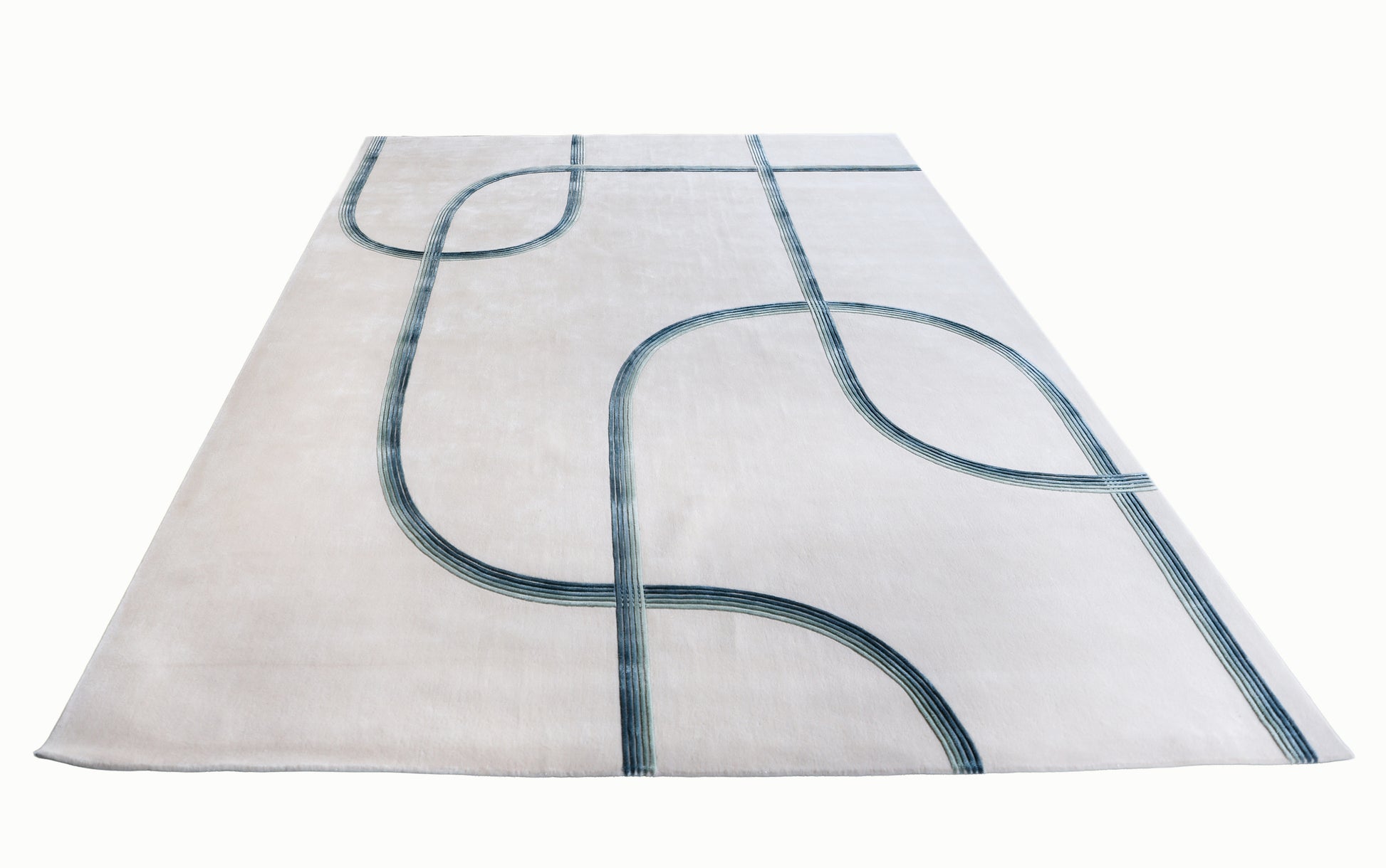 White rug with blue geometric patterns on a white background