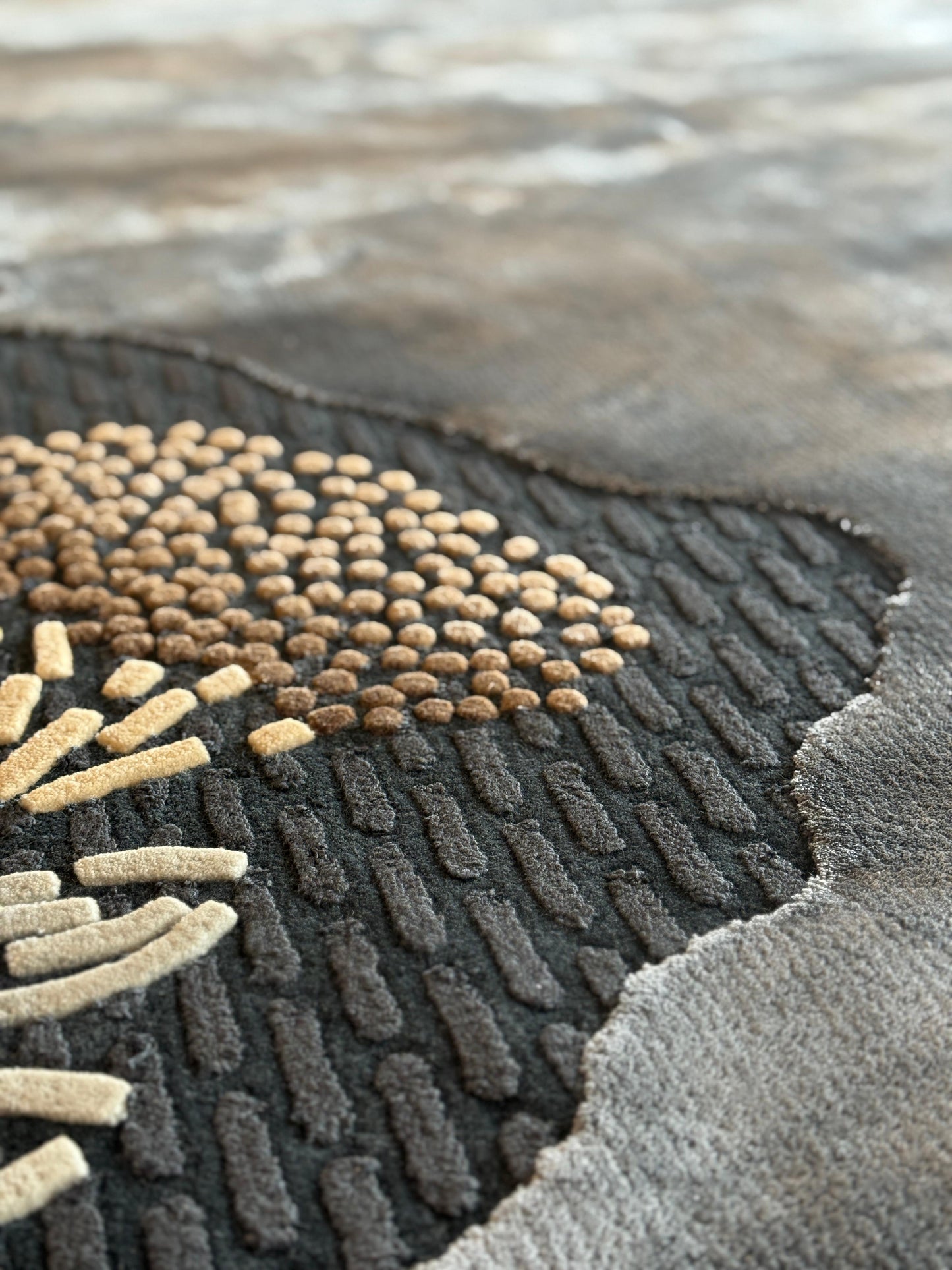Textured rug with geometric pattern on a neutral background