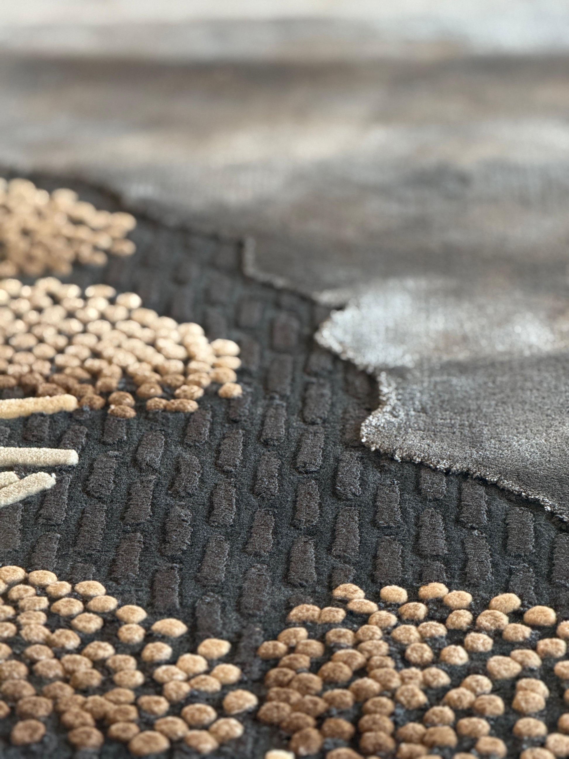 Textured black and brown rug with geometric pattern