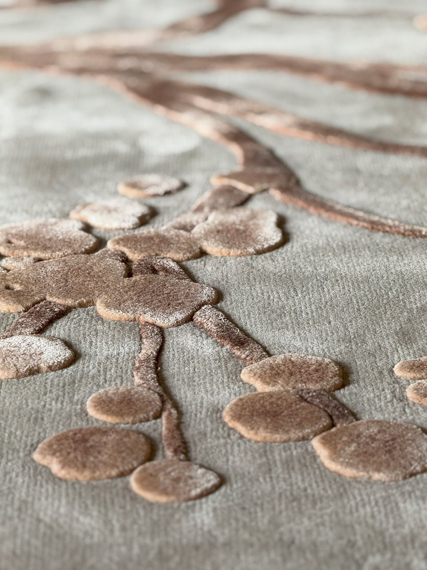 Textured brown shapes on a gray background