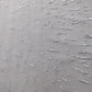 Textured gray surface with subtle patterns