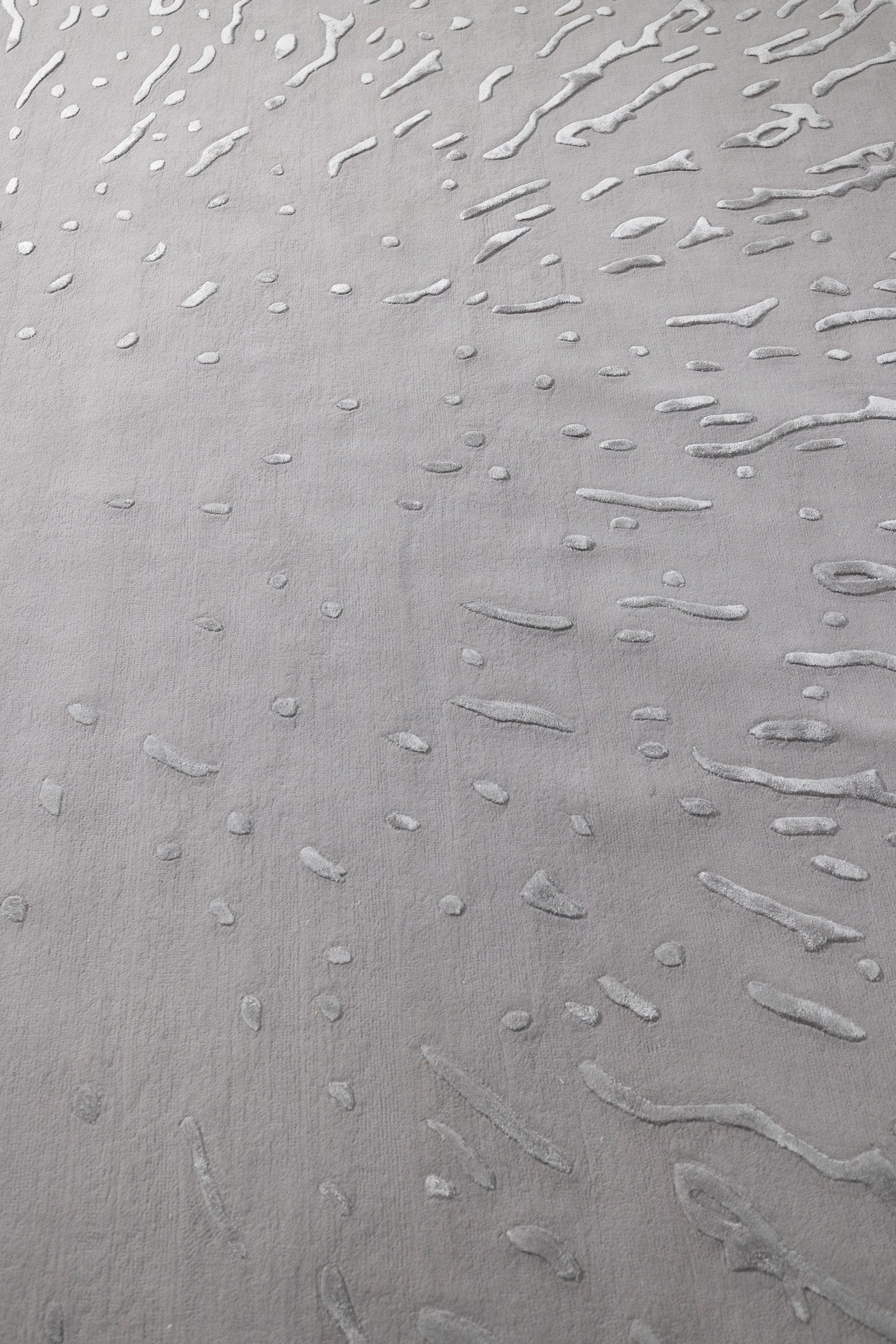 Textured gray surface with subtle patterns