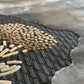 Textured rug with geometric pattern on a neutral background