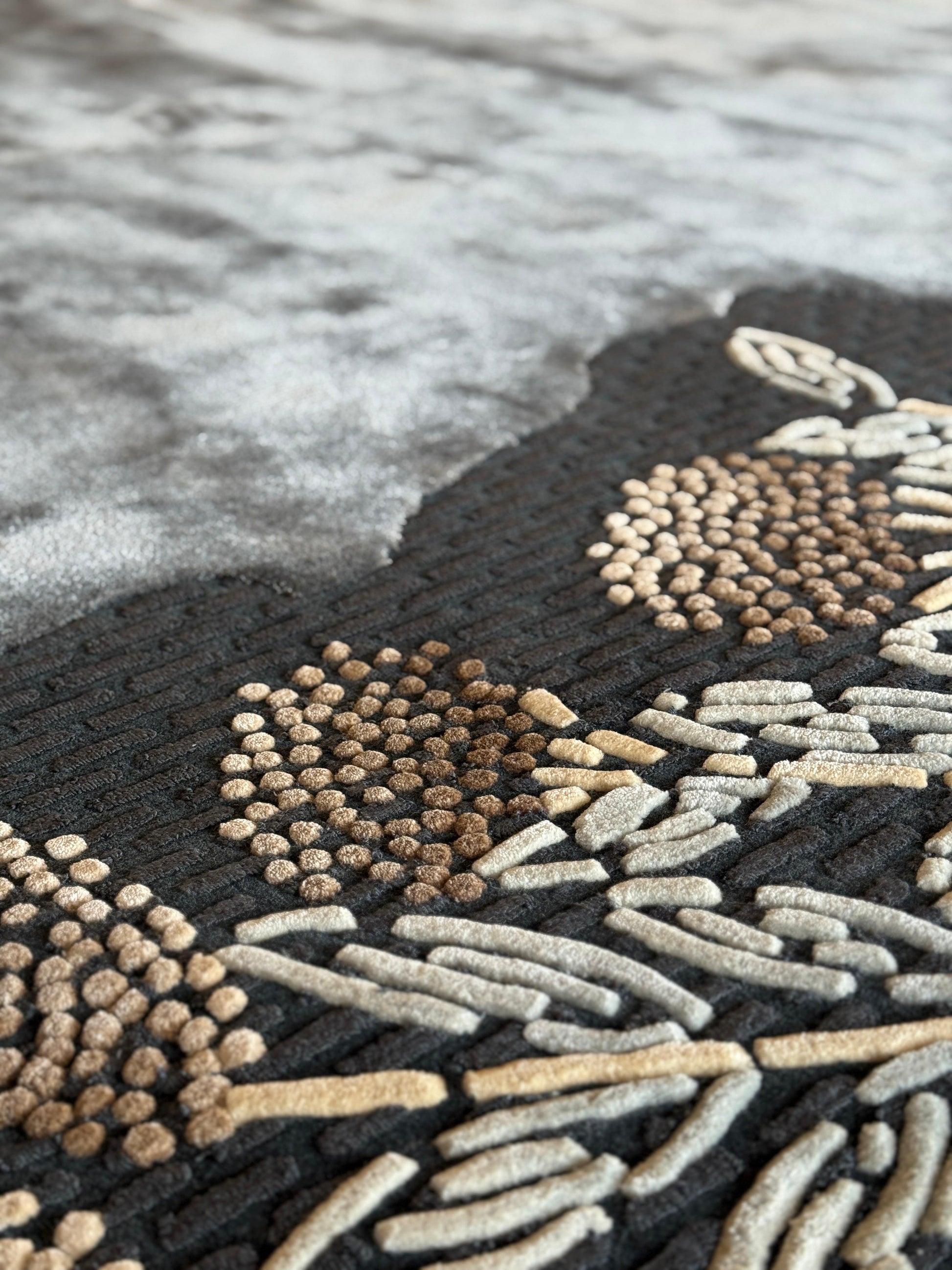 Close-up of a textured rug with geometric pattern