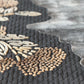 Close-up of a textured rug with geometric pattern