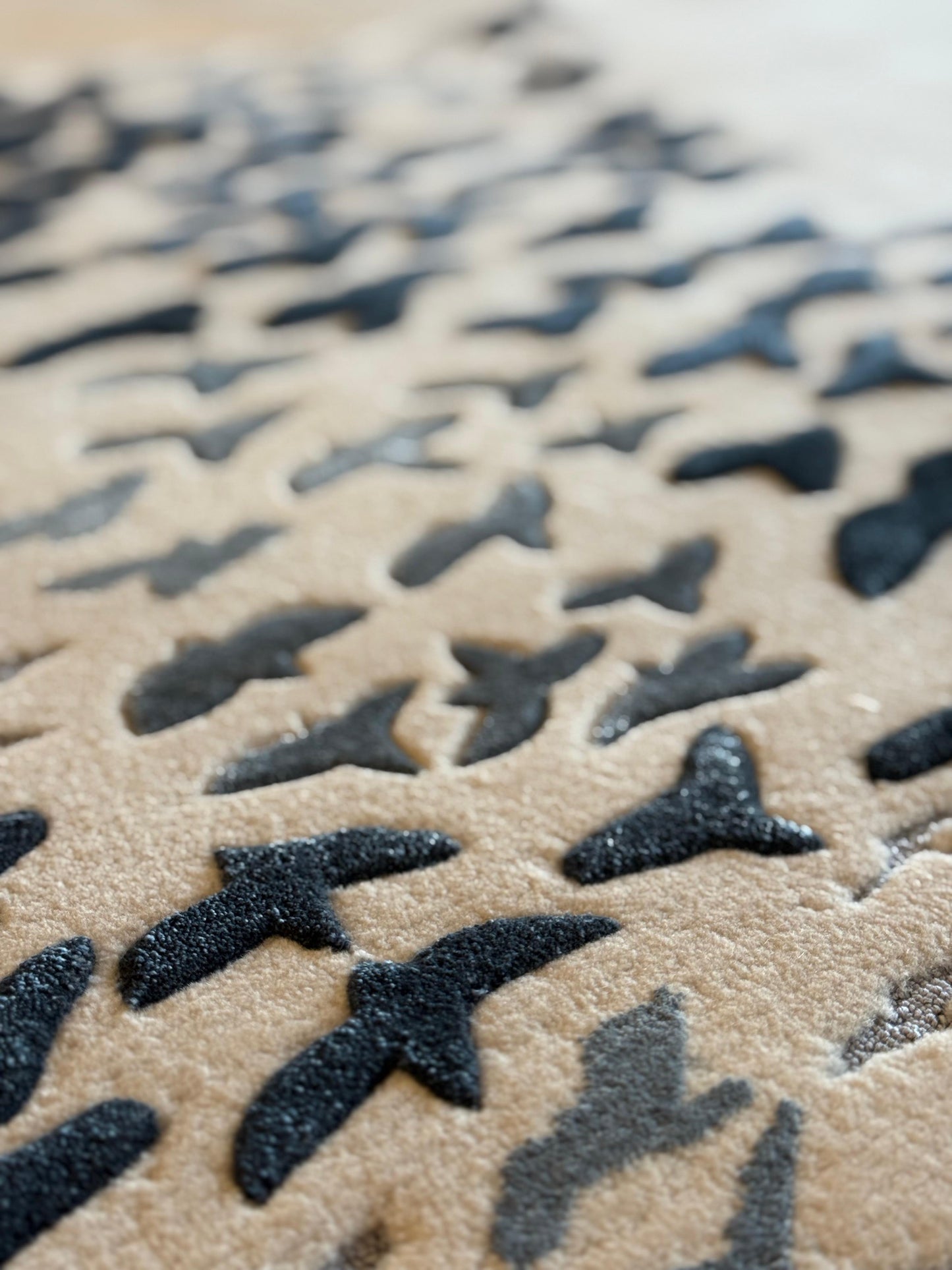 Close-up of textured surface with black and gray patterns